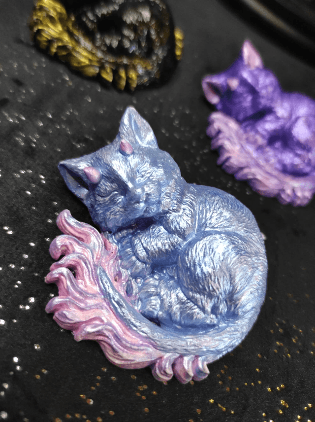 Chat-Dragon Endormi