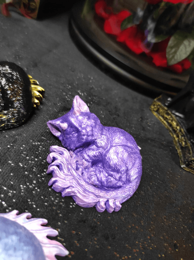 Chat-Dragon Endormi