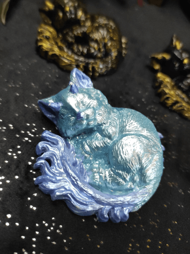 Chat-Dragon Endormi