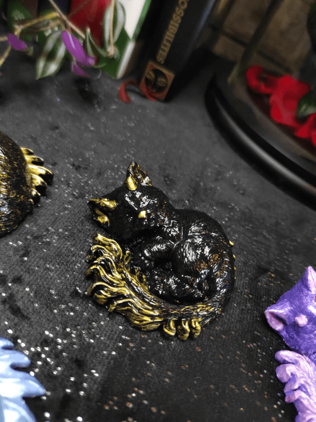 Chat-Dragon Endormi